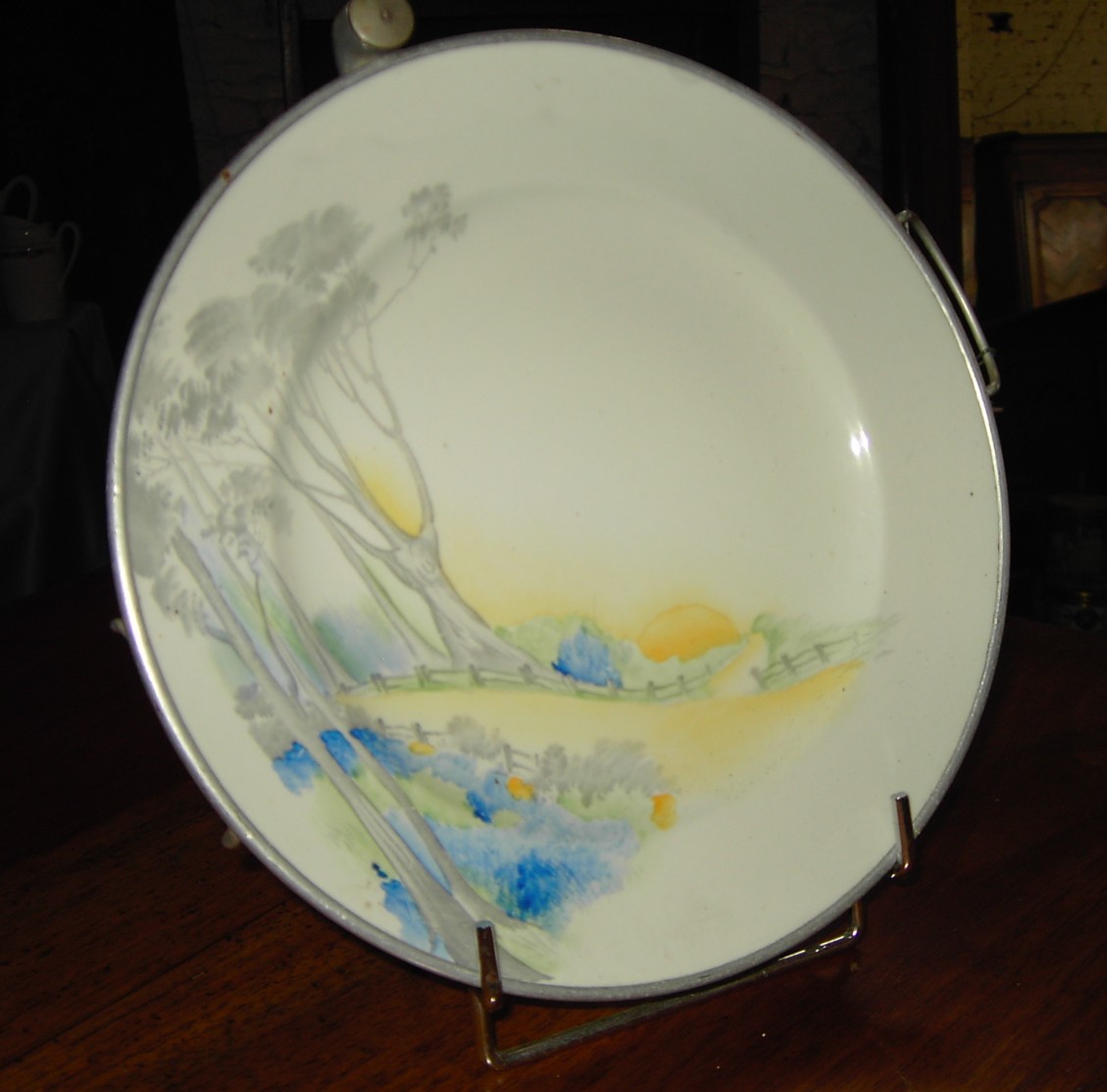 Assiette chauffante en porcelaine XXe