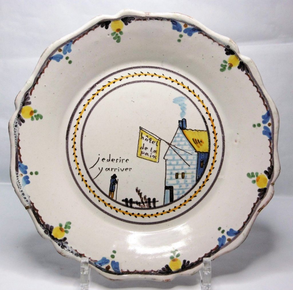 Nevers faience plate during French Revolution. Aiming at Peace: a traveler says "I want to get there" in front of the Peace Hotel.