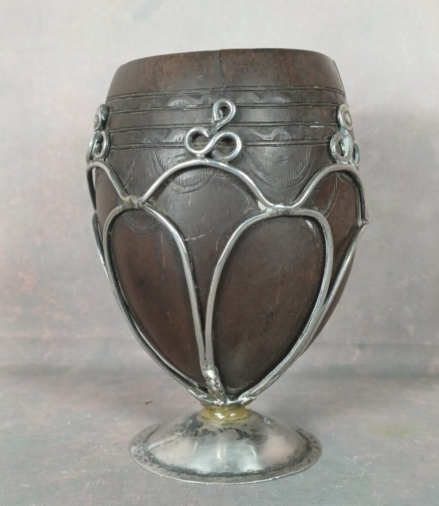 Antique chocolate mug from Mexico, Guatemala or Central America. Carved coconut mounted on sterling silver in the 18th or 19th century.