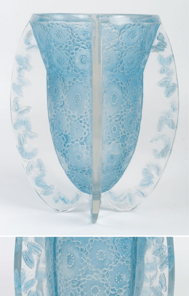This Papillons (butterflies) vase by Lalique created in 1936 has a blue patination. The shape is unconventional, ovoid with four fins.