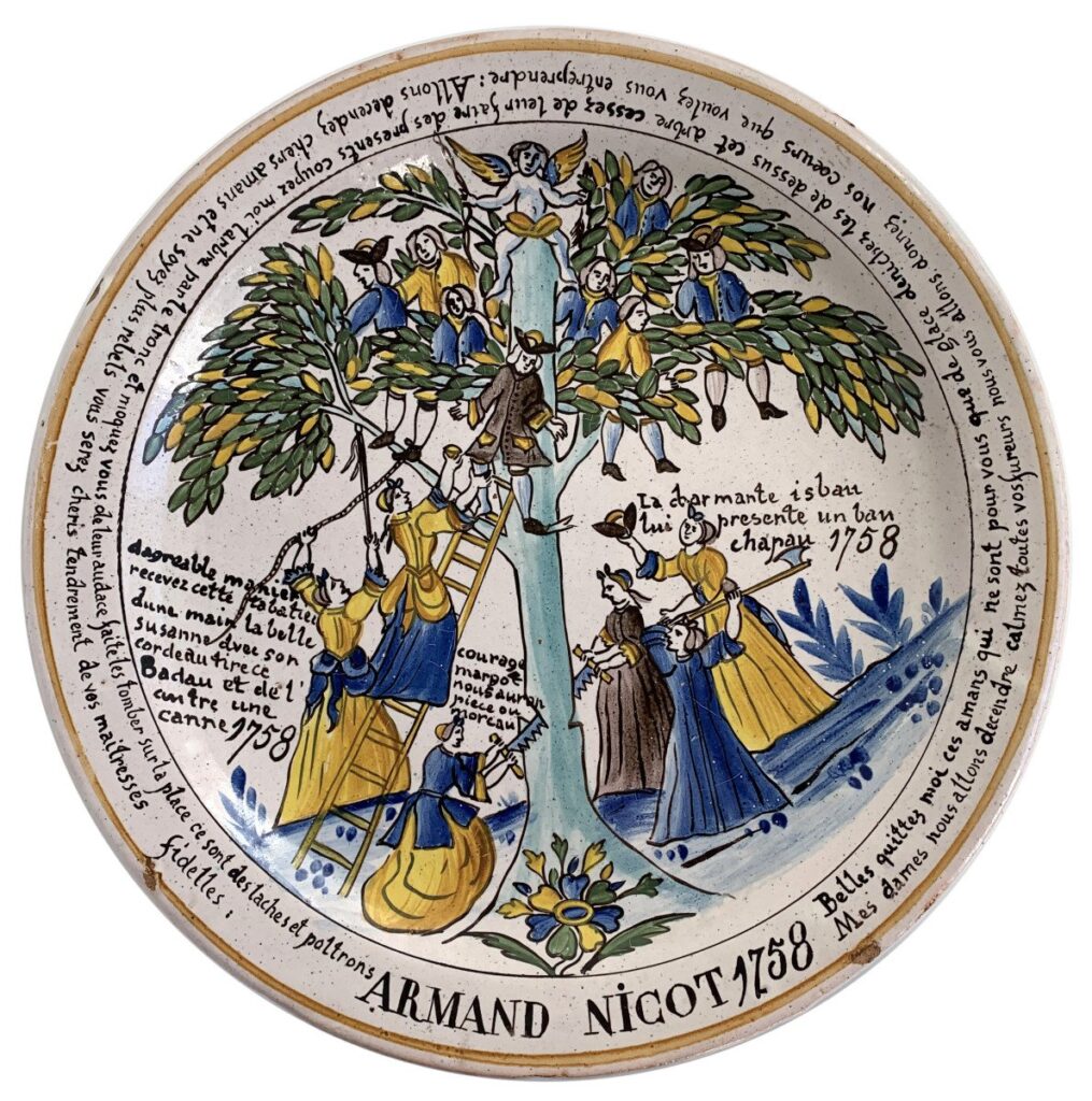 Patronymic faience dish from Nevers for Armand Nicot dated 1758. Decorated with Tree of Love: Women willing to go to any lengths to get their men down from a tree.