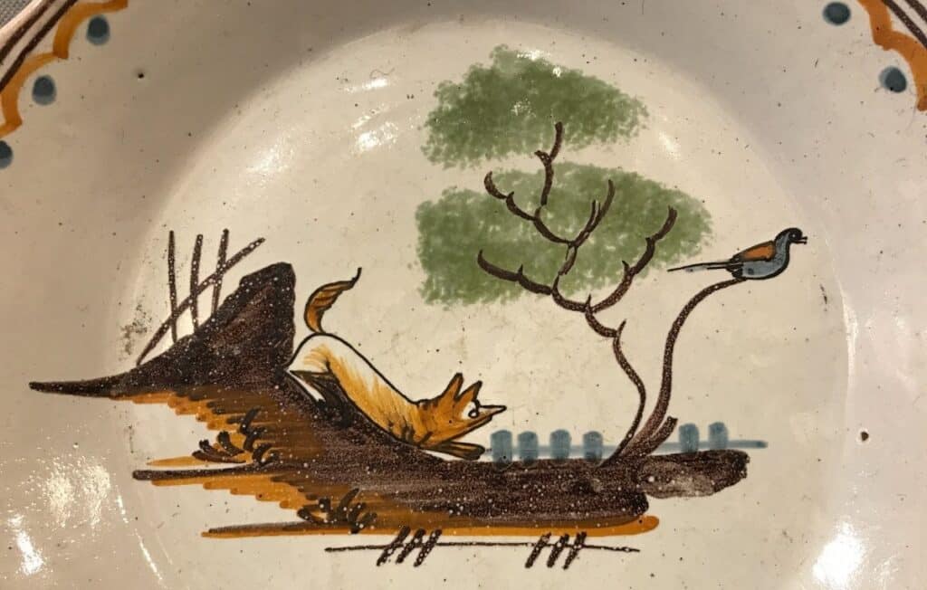 A fox after a bird on a 18th-century Nevers plate is a revolutionary symbol for liberty.