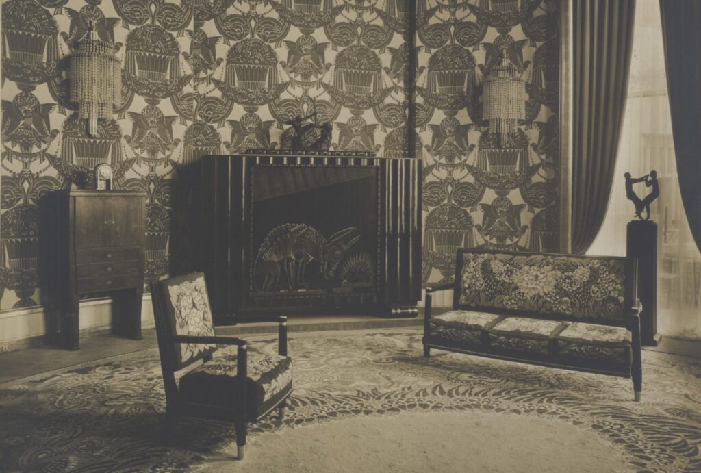 Grand Salon of the Pavillon du Collectionneur. Furniture designed by Ruhlmann. The large cabinet is in lacquer made by Jean Dunand