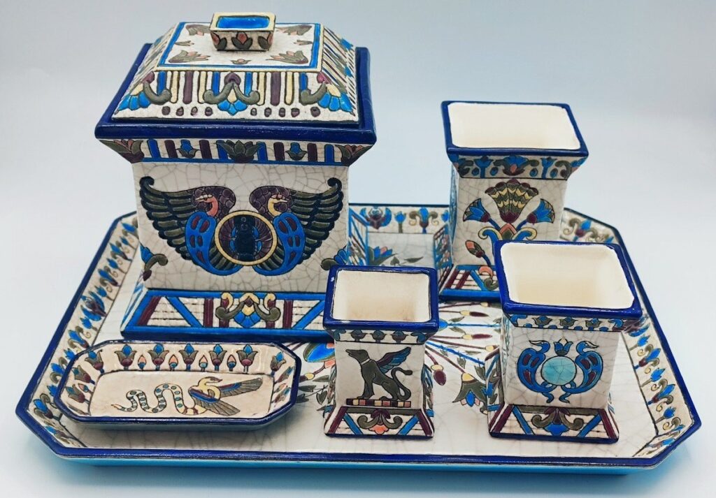 A complete six-piece set by Longwy made in the 19th century. The Egyptian motifs illustrate the Egyptomania that came in various waves during the 19th century.