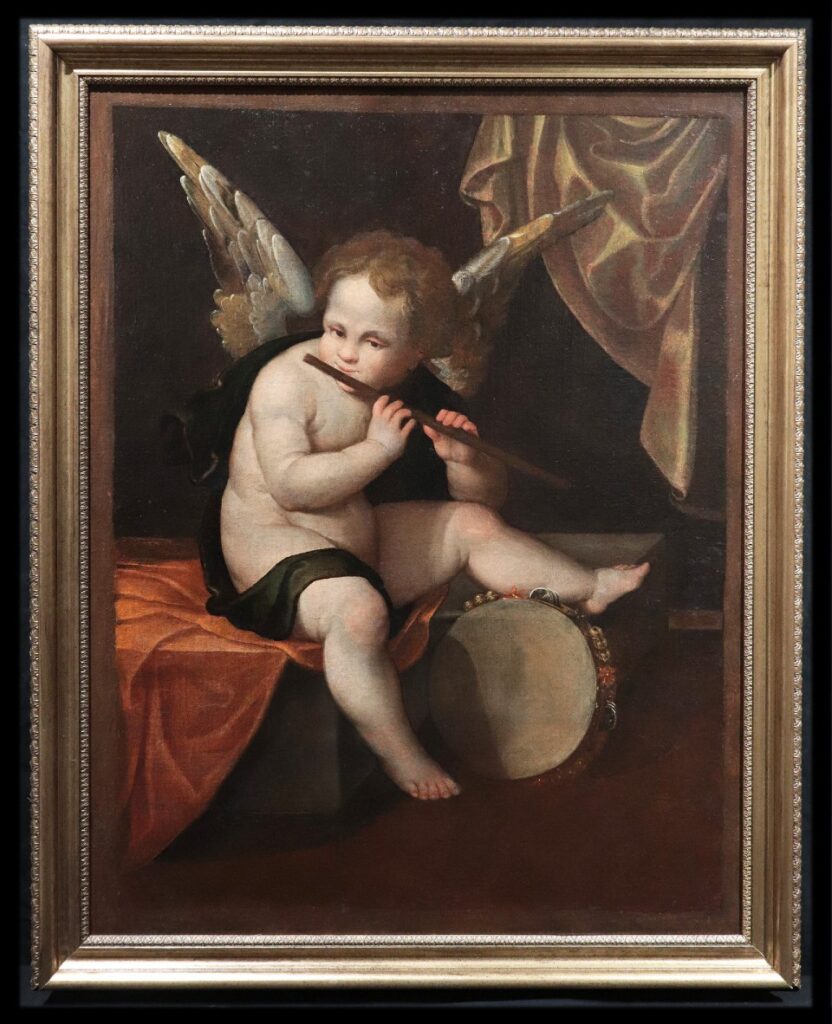 Oil on canvas depicting a musician angel who plays the flute and sits near a tambourine. It is attributed to Francesco Vecellio (c. 1475/1483-1560), brother of Titian.