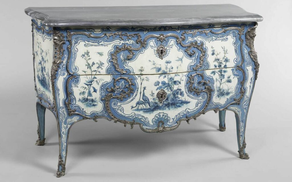 Probably the most famous chest of drawers by Mathieu Criaerd. In vernis Martin with a blue-and-white decor, silver bronze mounts, and a turquin blue marble top.
