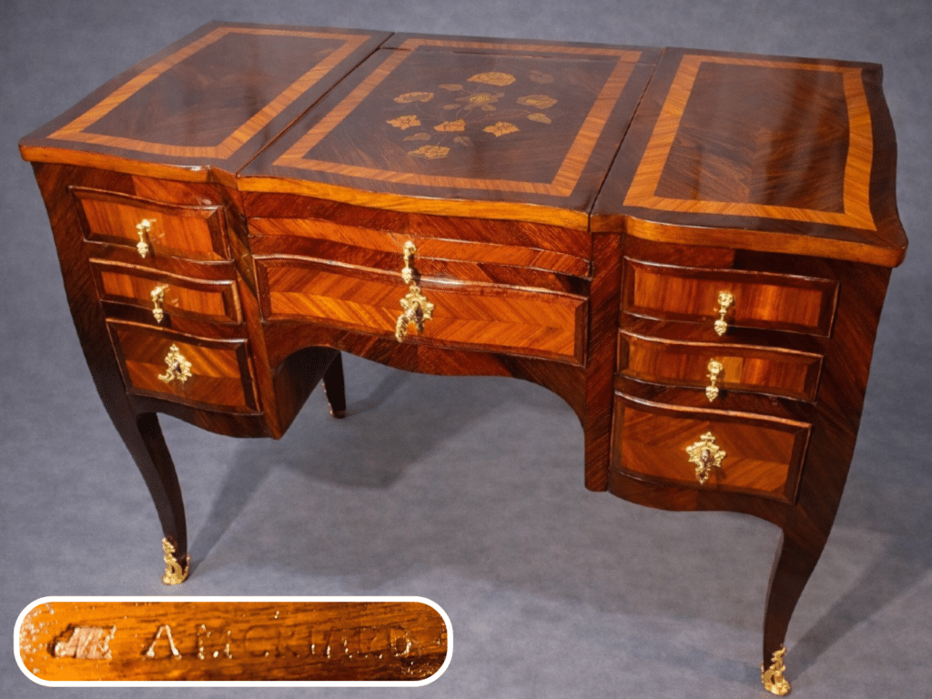 A dressing table by Antoine Mathieu Criaerd with the recognizable stamp "AM CRIARD" where the -e of the last name was dropped. Also branded "JME" for "Jurande des Menuisiers Ebénistes".