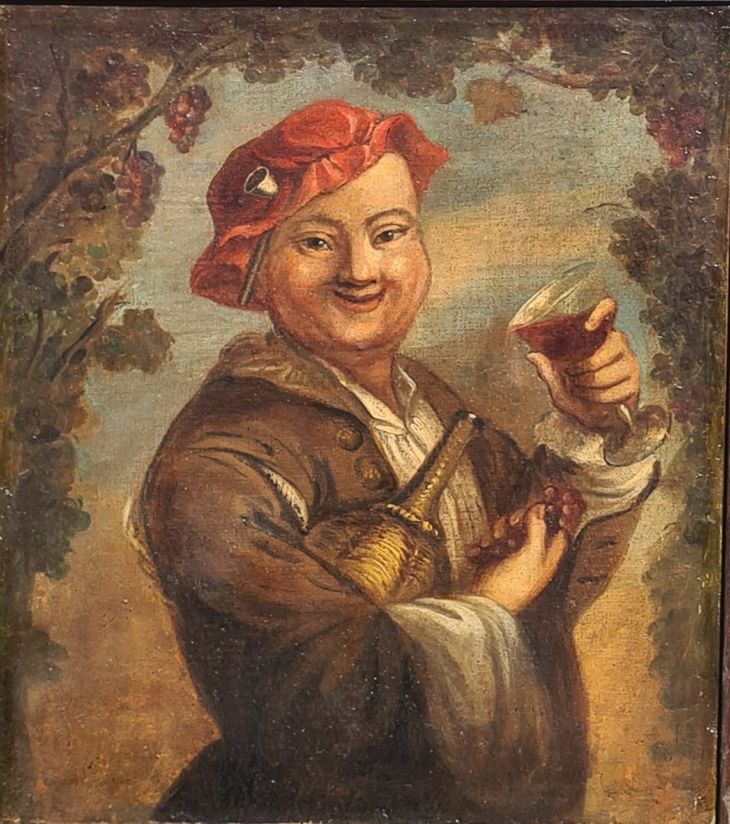 Portrait Of A Drinker Holding A Glass Of Wine Under A Vine