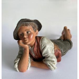 Young Boy Lying In Terracotta