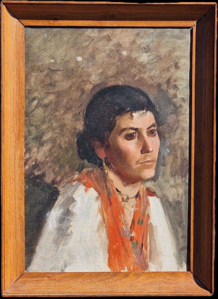 Portrait Of A Young Spanish Woman Wearing A Red Headscarf Or Shawl 