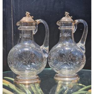 Pair Of Baccarat Crystal Ewers With Solid Silver Bases; Minerve-style Wine And Water Carafes