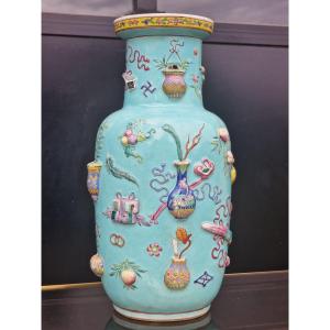 Chinese Porcelain Vase With Relief Depictions Of Antiquities On A Turquoise Background, Guangxu Period, Qing Dynasty