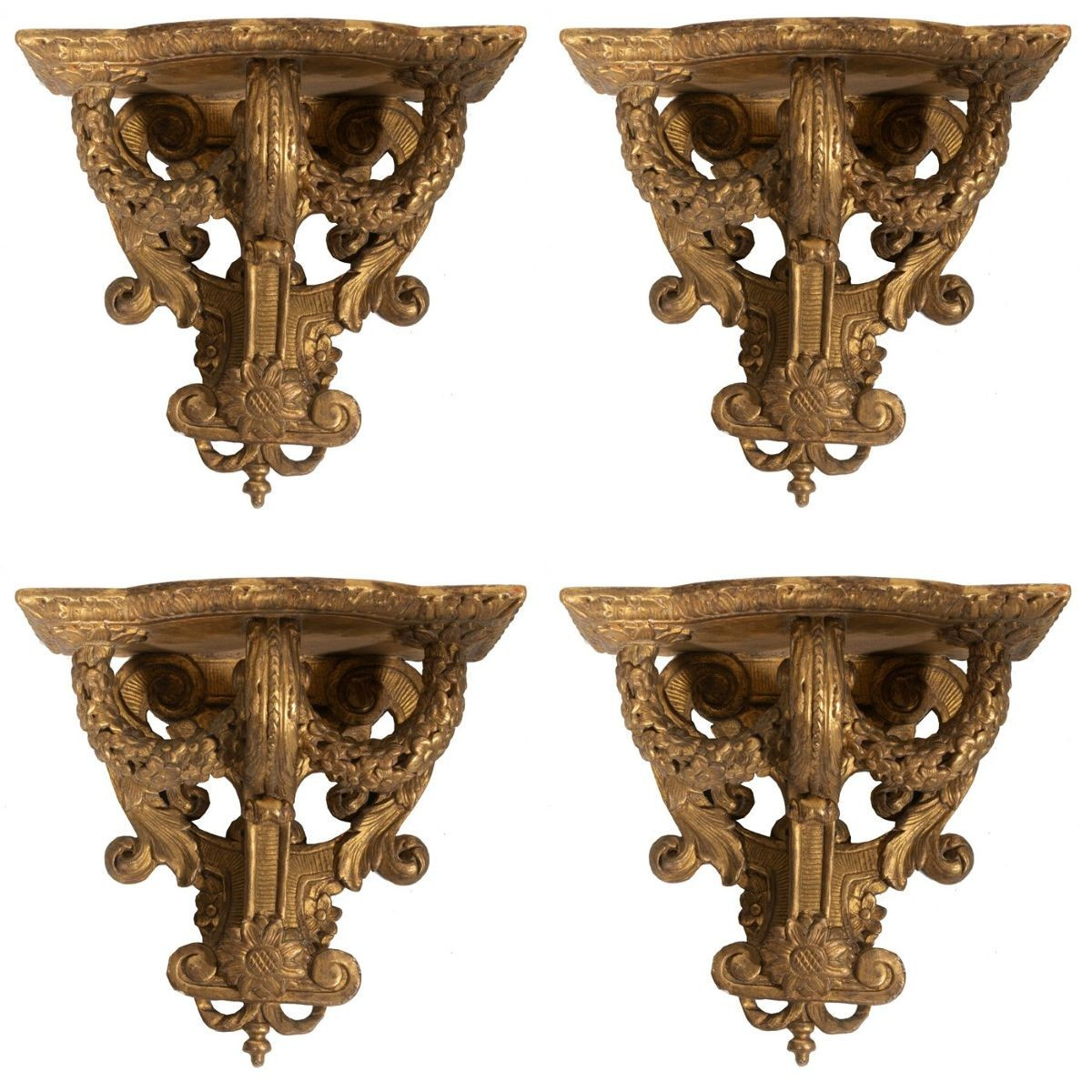 Ensemble de quatre consoles d'applique Régence