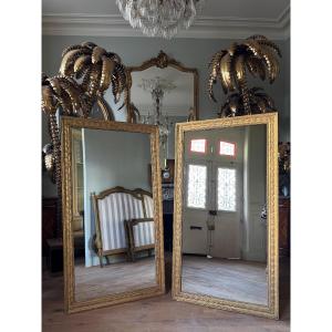 Paire De Miroirs Du Début Du XIXe En Bois Doré De Style Louis XVI