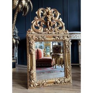 Italian Mirror From The Napoleon III Period In Golden Wood Decorated With A Baby Musician