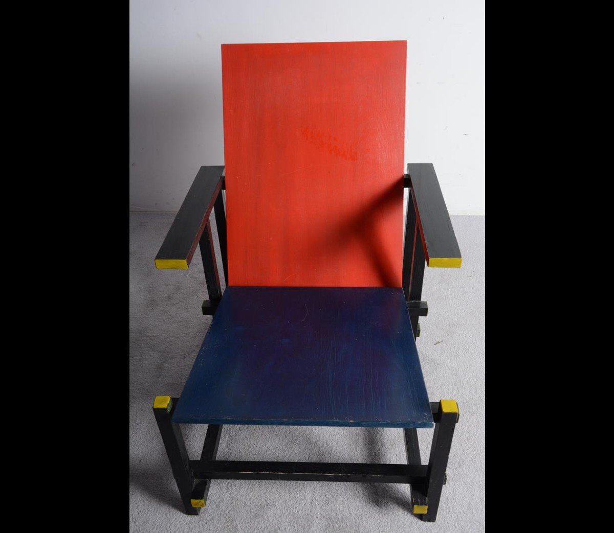 Red And Blue Armchair By Gerrit Rietveld Created In 1918.-photo-3