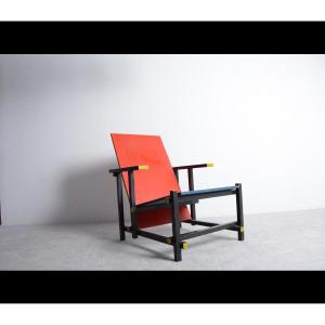 Red And Blue Armchair By Gerrit Rietveld Created In 1918.