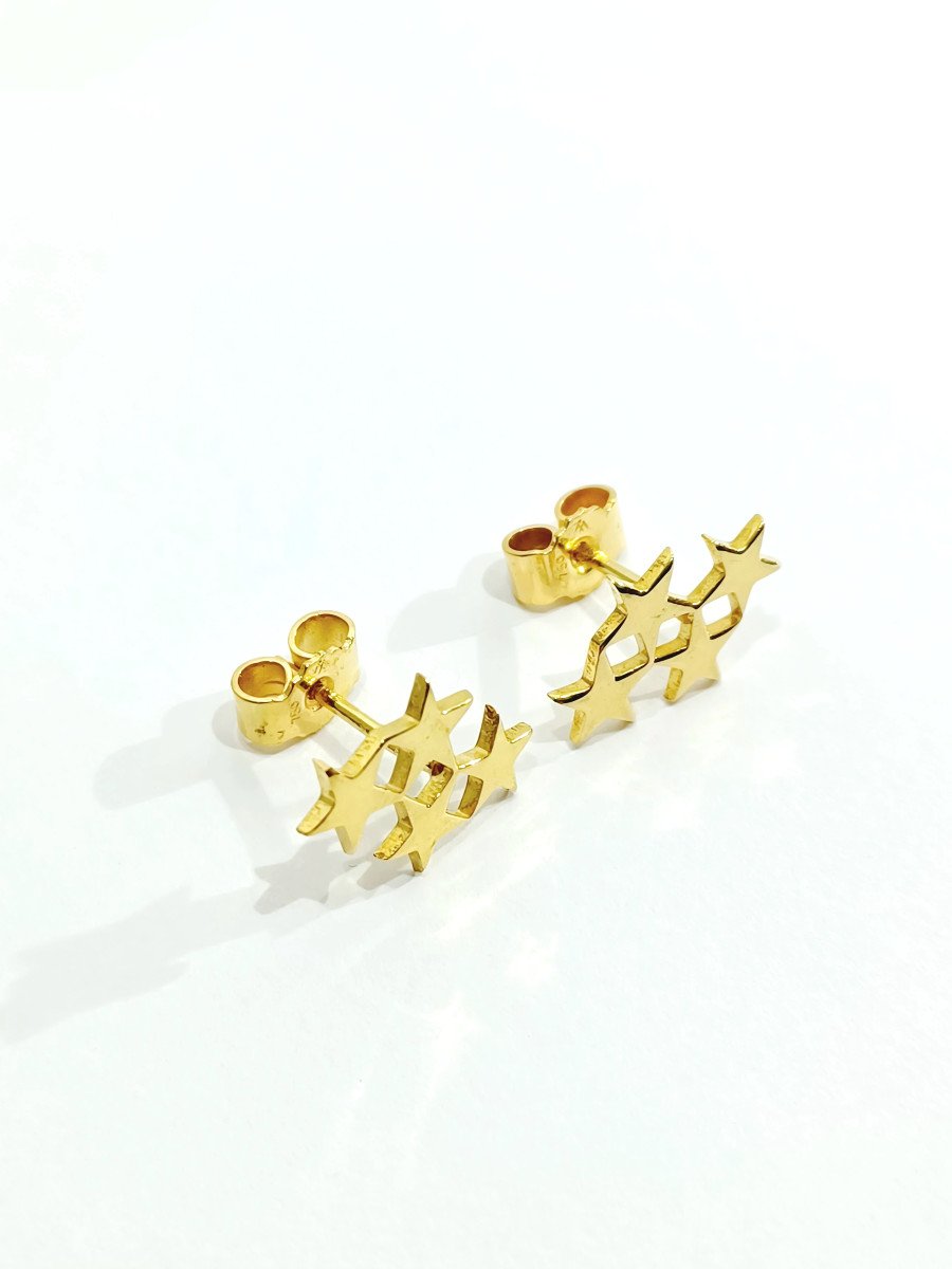 Pair Of Gold Star Earrings-photo-3