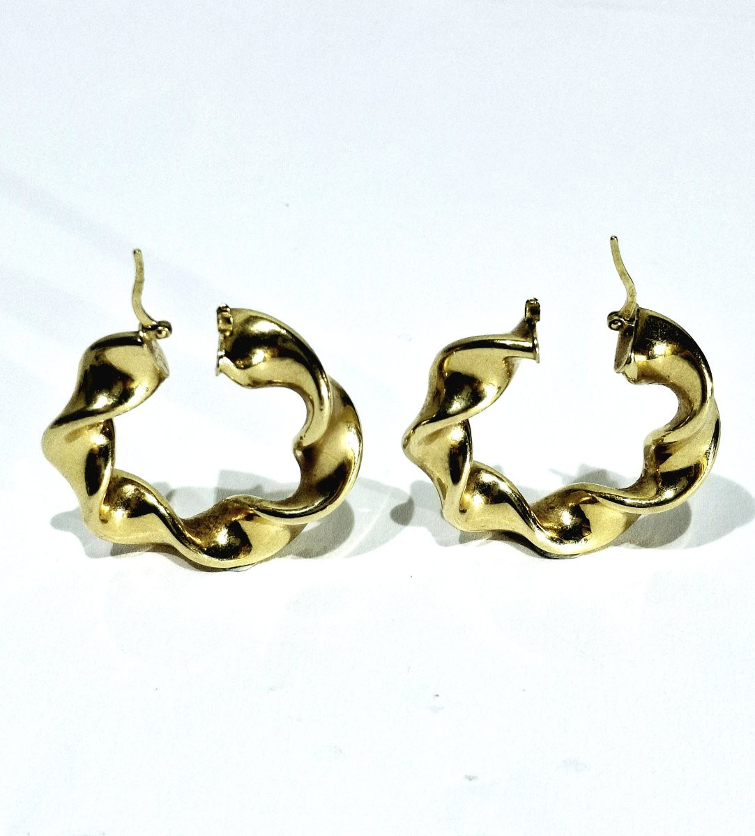 Pair Of Twisted Gold Hoop Earrings-photo-5
