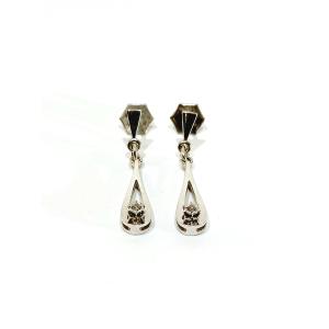 Paire de boucle d’oreille en or blanc et diamants