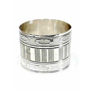 Rond de serviette en argent massif stries et laurier