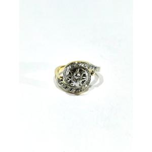 Bague tourbillon en or jaune, blanc et diamants
