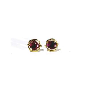 Paire de boucle d’oreille en or et rubis