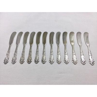 Series Of 12 Silver Butter Knives