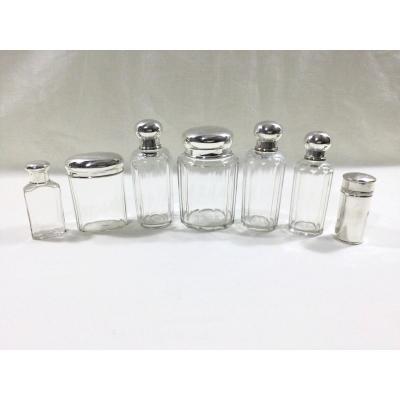 Set Of Crystal And Silver Bottles