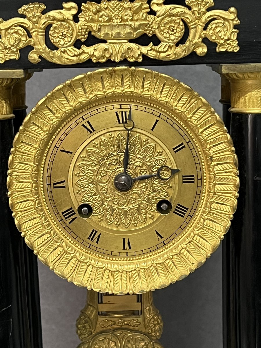 Empire Clock With 4 Columns, Pendulum, In Blackened Wood With Mercury-gilt Bronzes.-photo-2