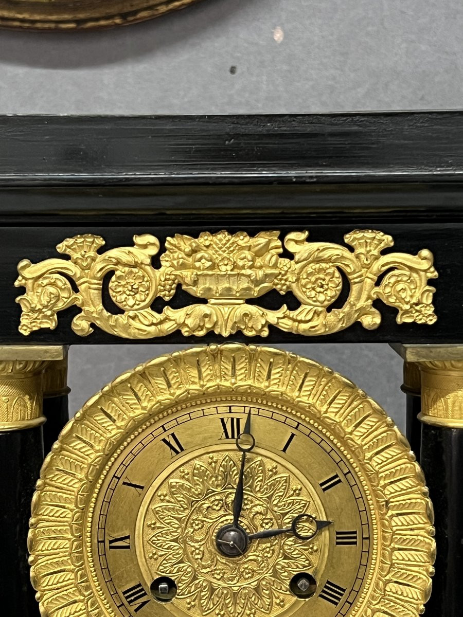 Empire Clock With 4 Columns, Pendulum, In Blackened Wood With Mercury-gilt Bronzes.-photo-4