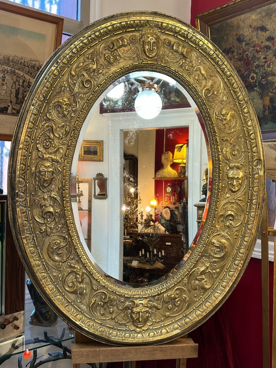 A. Arens, Antwerp, Important Oval Mirror In Repoussé Brass With Many Animal Decors Etc..