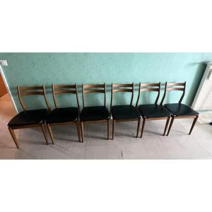 Suite de six chaises vintage scandinaves. Assise en skaï noir, édition EROS vers 1960