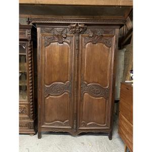 Armoire  de mariage en chêne. Chef-d’œuvre d’élégance et de tradition Normande du XIXe siècle