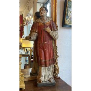 Sculpture en bois polychrome représentant un saint diacre ou un moine, d’époque du XVIIIe