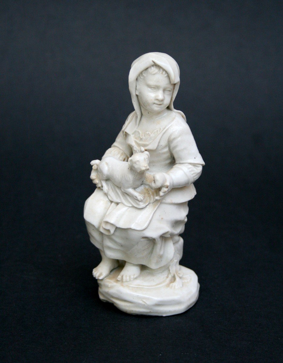 Italien Porcelaine émaillée Blanc  Figure d'Une Fille Avec Un Chien XVIIIème