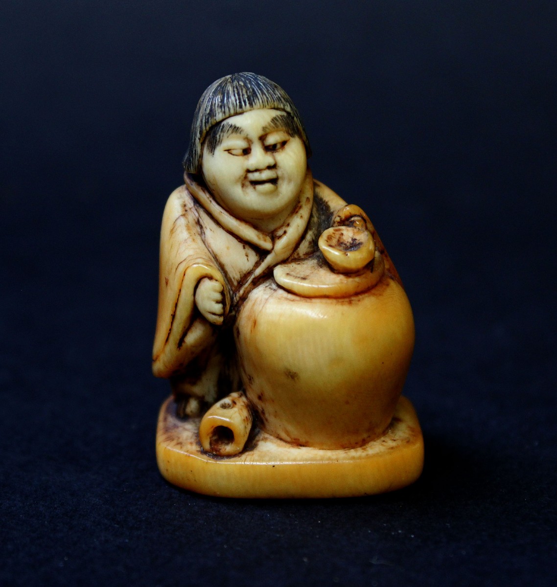 18th Century Japanese Ivory Netsuke Depicting A Shōjō With A Sake Jar Edo