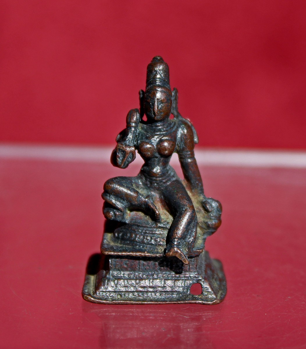 Antique Indian Chola Bronze Miniature Of Parvati Seated On A Lion, C12th–13th Hindu Goddess