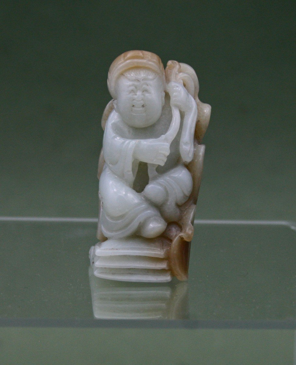 Chinese Jade Sculpture Of Boy With Book And Lotus Leaf Qing