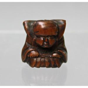 Netsuke japonais antique en buis sculpté
