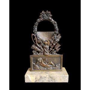 PORTE-MONTRE EN BRONZE PATINÉ ÉPOQUE CHARLES X VERS 1825