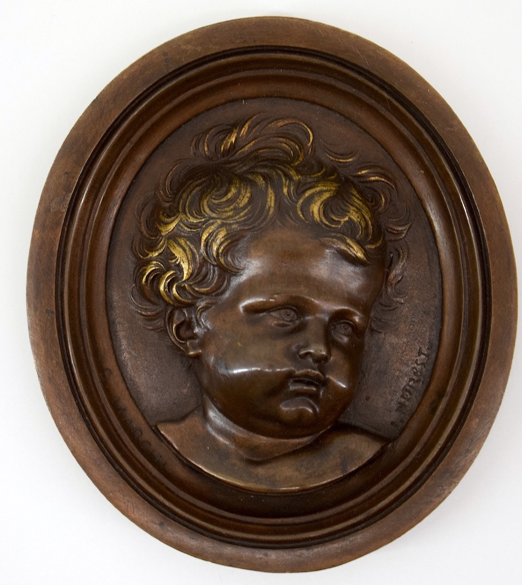 JEAN NOREST  miniature   Médaillon ovale  en bronze portrait enfant  ref1138