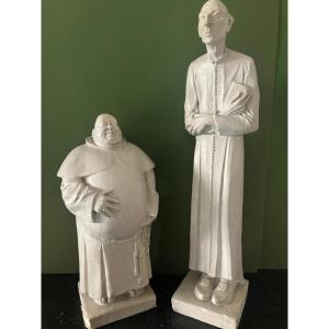 Caricature Statues Of Pol Quentin, A Pot-bellied Monk And A Slender Priest 