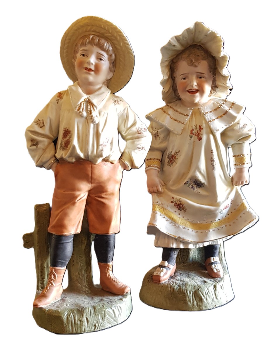 A Pair Of Antique Bisque Figurines, Children Dressed As Little Farmers