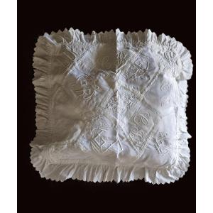 Housse de coussin ancienne en patchwork de monogrammes brodés