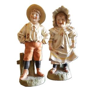 A Pair Of Antique Bisque Figurines, Children Dressed As Little Farmers