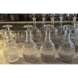 Ensemble de 4 carafes en cristal, modèle dit “SS” Baccarat ou Saint‑Louis, époque Restauration