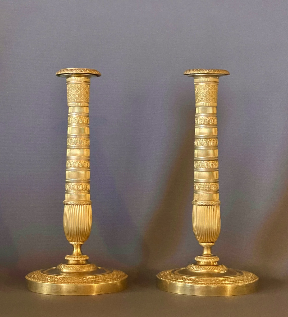 A Pair Of Empire Gilt-bronze Candlesticks. Early 19th Century. 