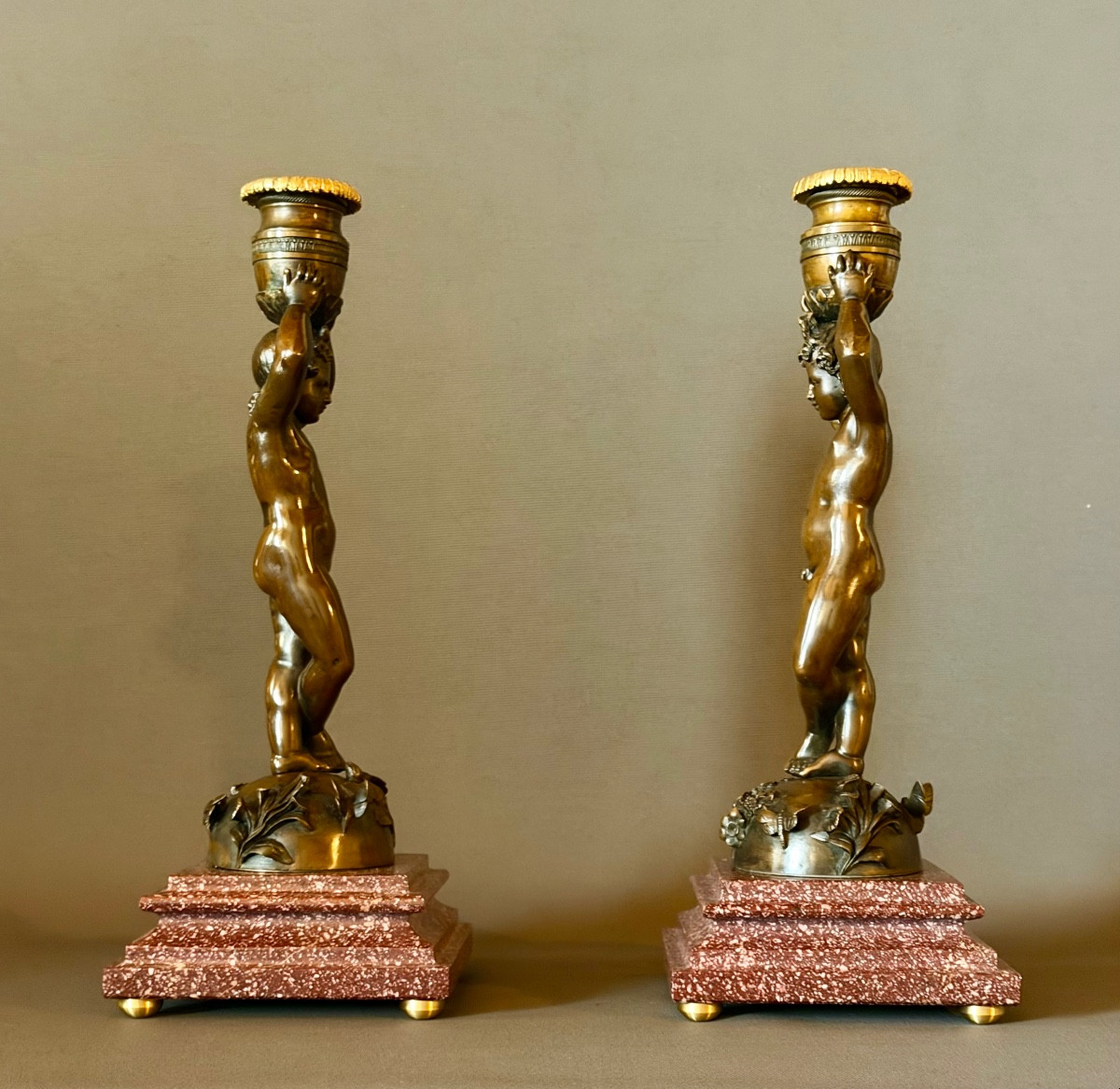 A Pair Of Patinated Bronze Candlesticks With Putti Depicted As Canephores. Circa 1850-photo-3