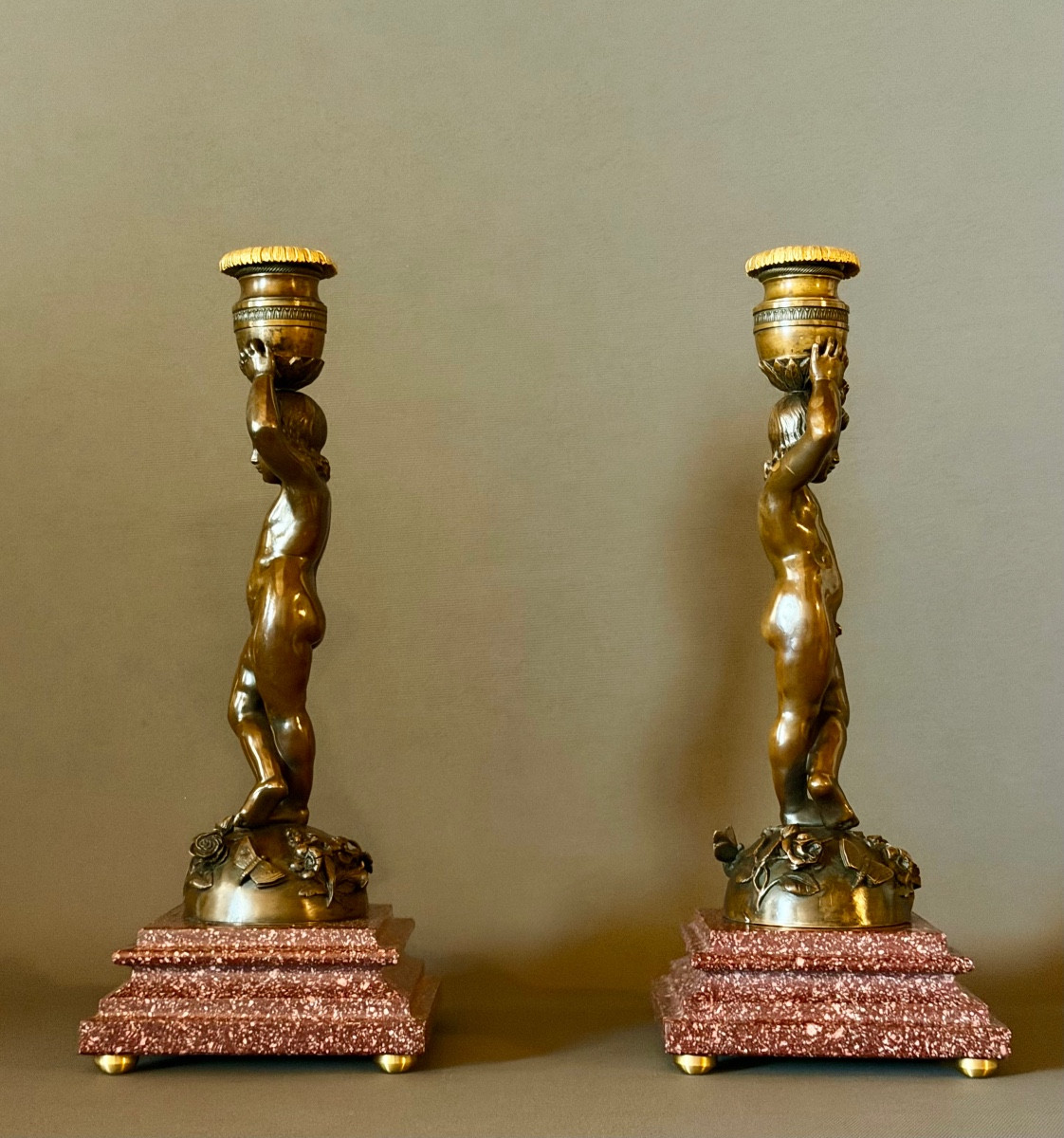 A Pair Of Patinated Bronze Candlesticks With Putti Depicted As Canephores. Circa 1850-photo-1